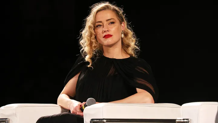 Amber Heard speaks on the stage during the 69th Taormina Film Festival.