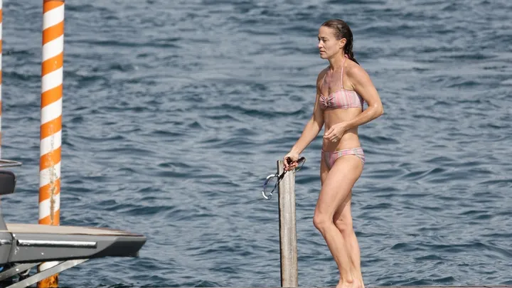 Pippa Middleton in a striped bikini during Italian vacation. (Backgrid)