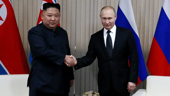 arms deal: Russian President Vladimir Putin, right, greets North Korean Leader Kim Jong Un during their meeting on April 25, 2019 in Vladivostok, Russia