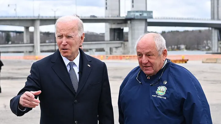 President Biden, left, speaks to Geno Marconi