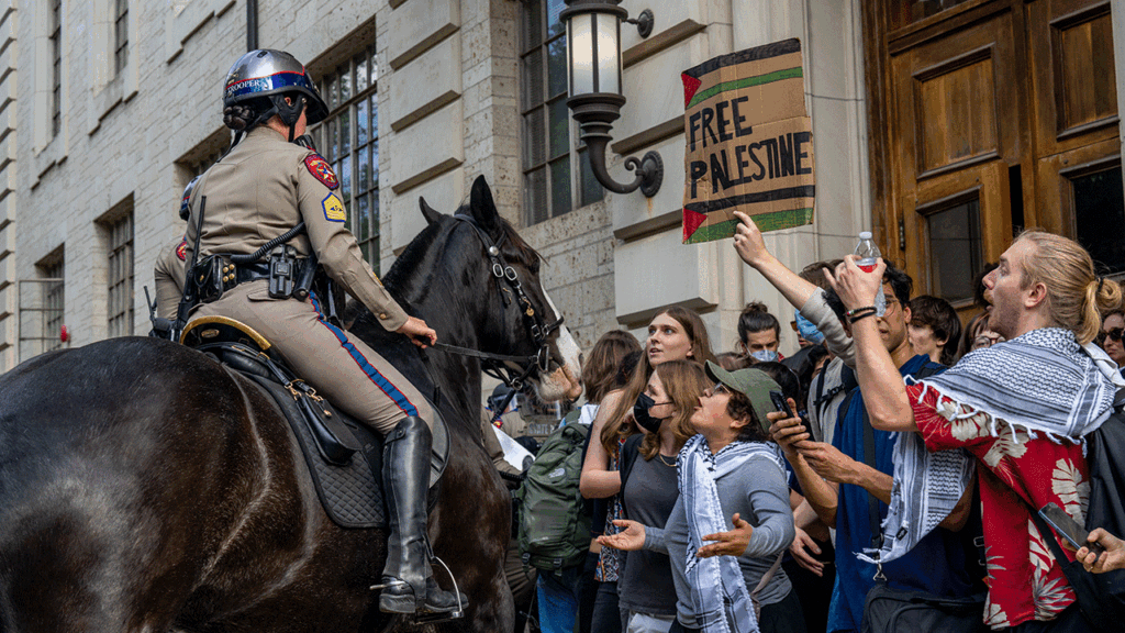 Mounted police work to contain demonstrators protesting the war in Gaza at the University of Texas at Austin on April 24, 2024. 