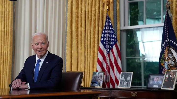 President Biden pauses before addressing the nation from the Oval Office of the White House in Washington